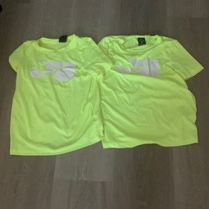 two neon nike shirts